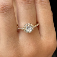 ANILLO COMPROMISO PIEDRA CENTRO CON CIRCONES BLANCOS