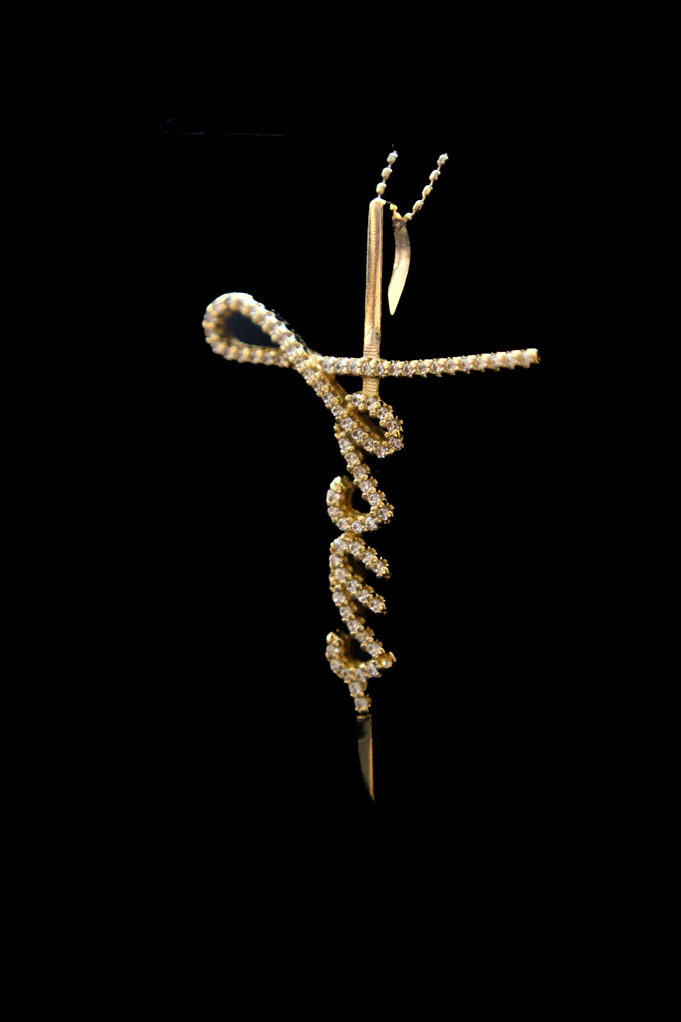 DIJE CRUZ PALABRA JESUS GRANDE CON CIRCONES BLANCOS