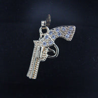 DIJE REVOLVER CIRCONES BLANCOS
