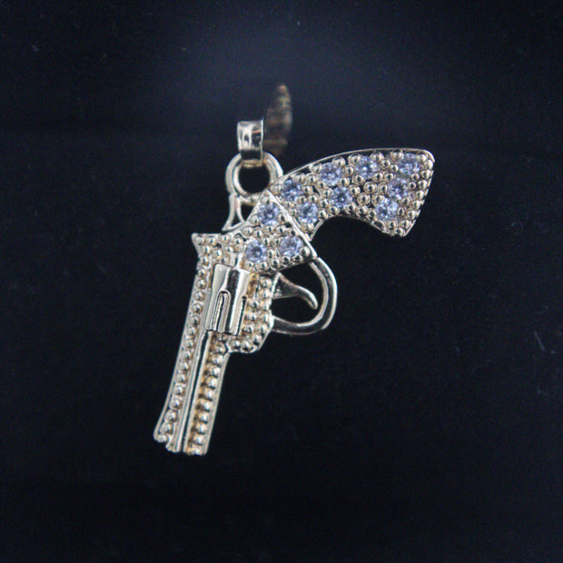 DIJE REVOLVER CIRCONES BLANCOS
