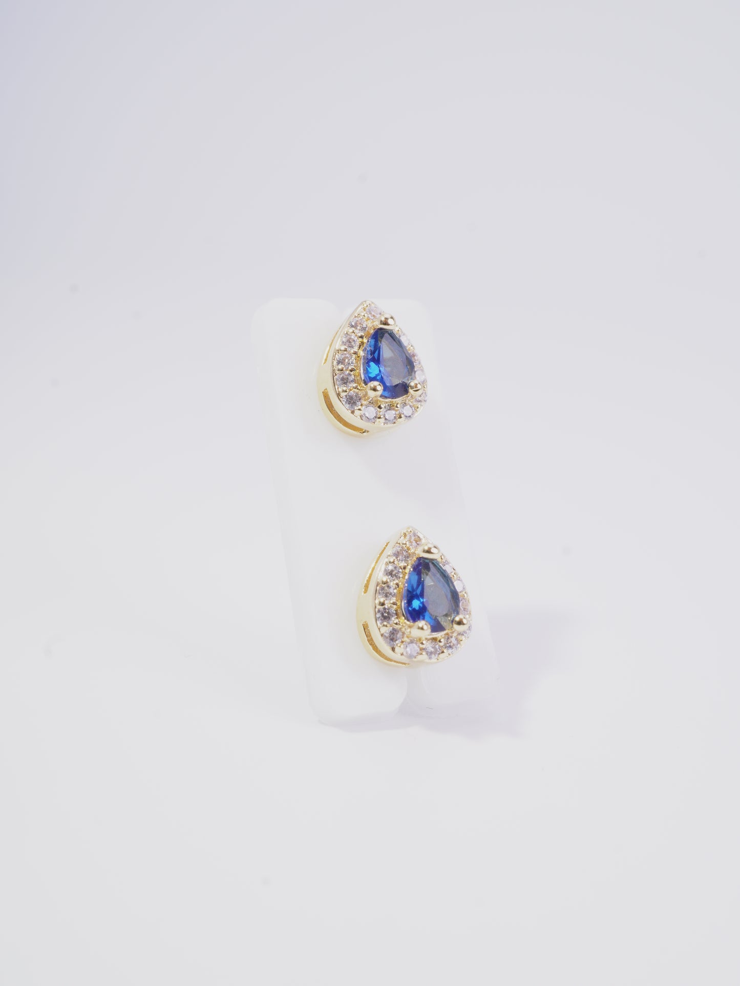 TOPO GOTA BORDE CIRCON, CENTRO PIEDRA VERDE Y AZUL