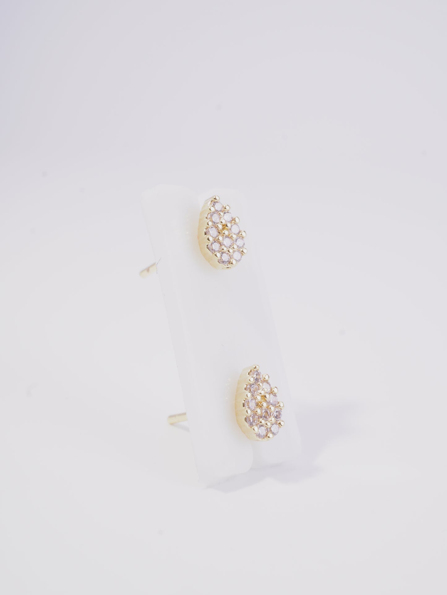 TOPO GOTA PEQUEÑA RELLENO CIRCONES BLANCOS