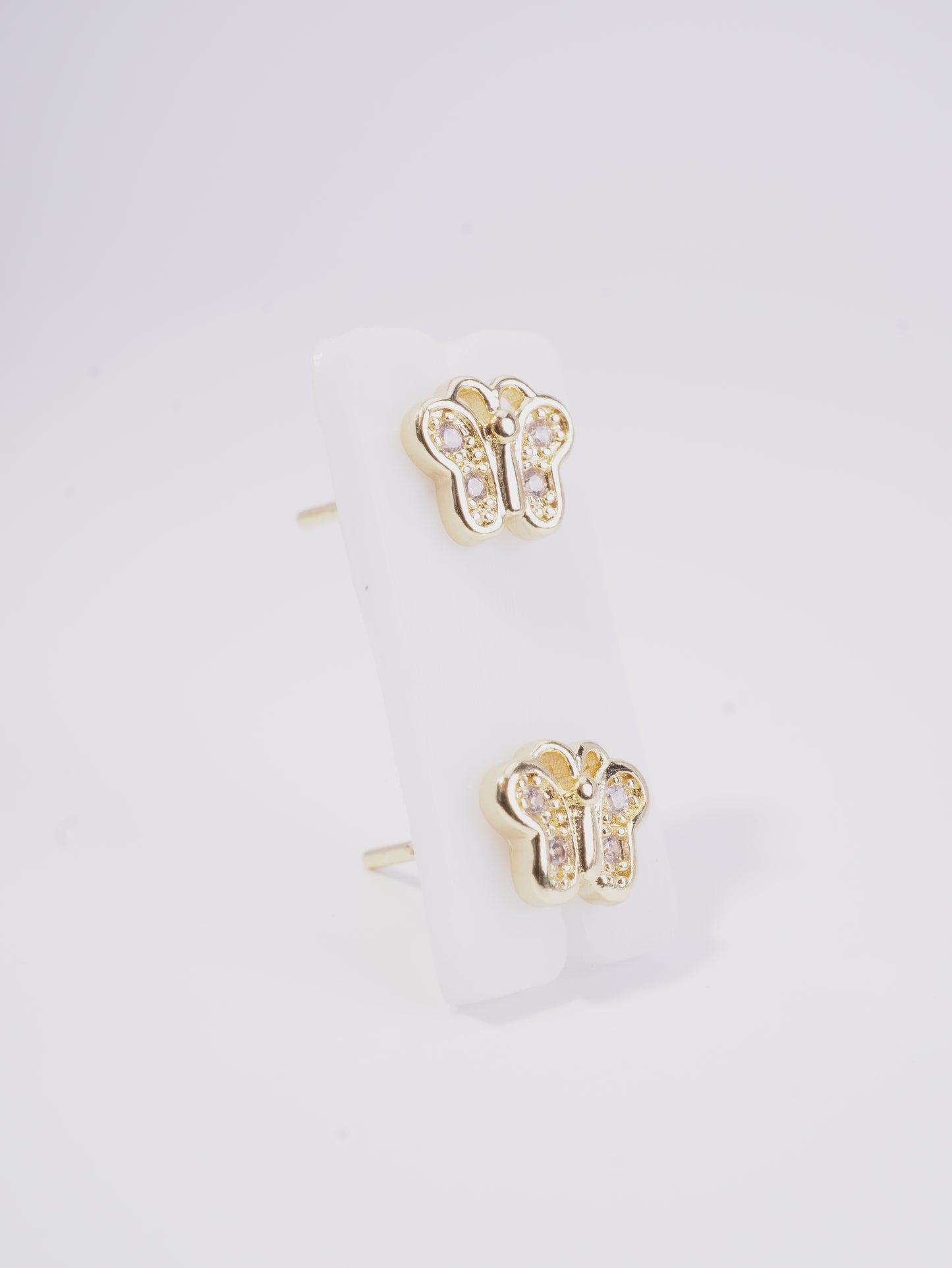 TOPO MINI MARIPOSA CON CIRCONES BLANCOS